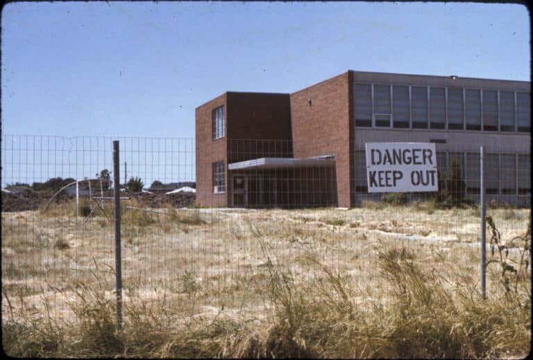 Image of fence with a sign that says "Danger, Keep Out"